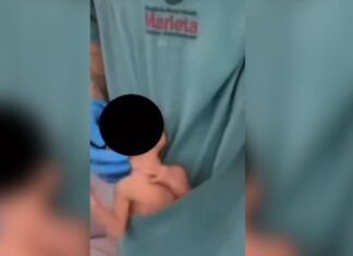 Autoridades iniciam investigação sobre fisioterapeuta que aparece dançando com recém-nascido dentro do jaleco, no Marieta