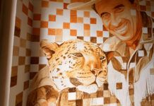 Tinta de terra: Artista plástico retrata Beto Carrero e o leopardo Marco na entrada do parque