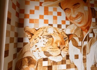 Tinta de terra: Artista plástico retrata Beto Carrero e o leopardo Marco na entrada do parque
