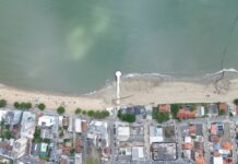 Megaobra de alargamento da faixa de areia da Praia Central avança até o molhe da Avenida Getúlio Vargas
